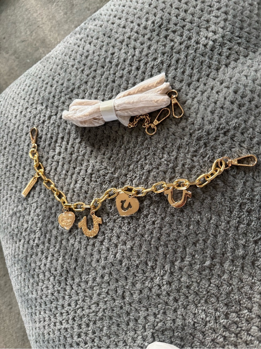 True Religion bag charm and purse handle